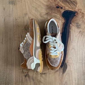 Coach running shoes never worn